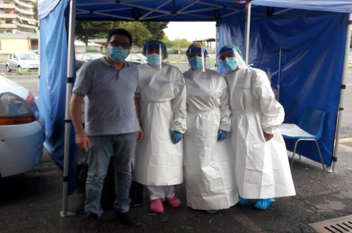 Drive in sotto la pioggia a Labaro