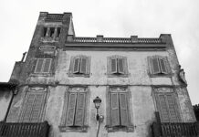 Architettura Contemporanea nella Tuscia, Palazzo Menghini in Piazza Umberto I a Oriolo città ideale