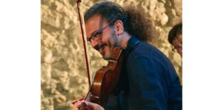 Restare viterbese suonando nel mondo: il percorso di Gianluca Saggini Gianluca Saggini-cover